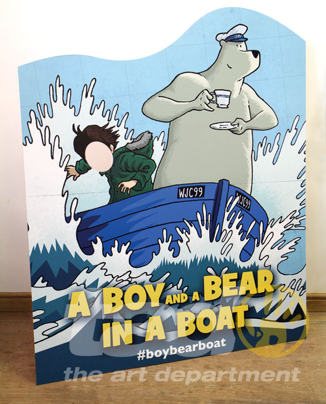 standee bear in a boat